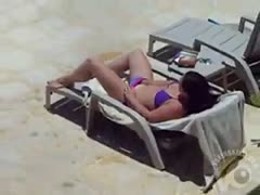 Bikini brunette wife caught masturbating her pussy poolside